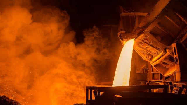 pouring molten metal out